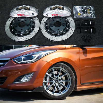 comprar 4 Piston Racing Caliper Hyudnai Kit de freno grande 355 * 32 MM Disco de alto carbono de carreras y pastillas de freno para ELANTRA 18 pulgadas Fabricación en línea