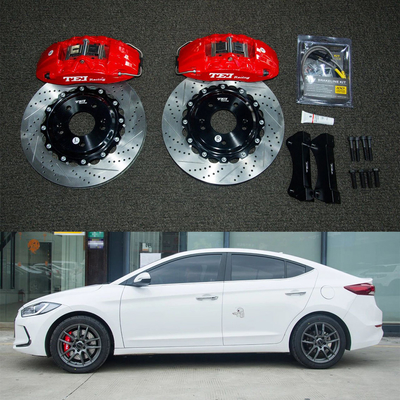 comprar 4 Piston Racing Caliper Hyudnai Kit de freno grande 330 * 28 MM Disco de alto carbono de carreras y pastillas de freno para Elantra 17 pulgadas Fabricación en línea
